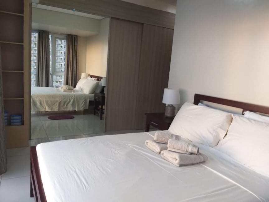 De Luxe, Standard And Studio Suites -The Breeze Residences-Close To Airport,Mall Of Asia, Us Embassy มะนิลา ภายนอก รูปภาพ